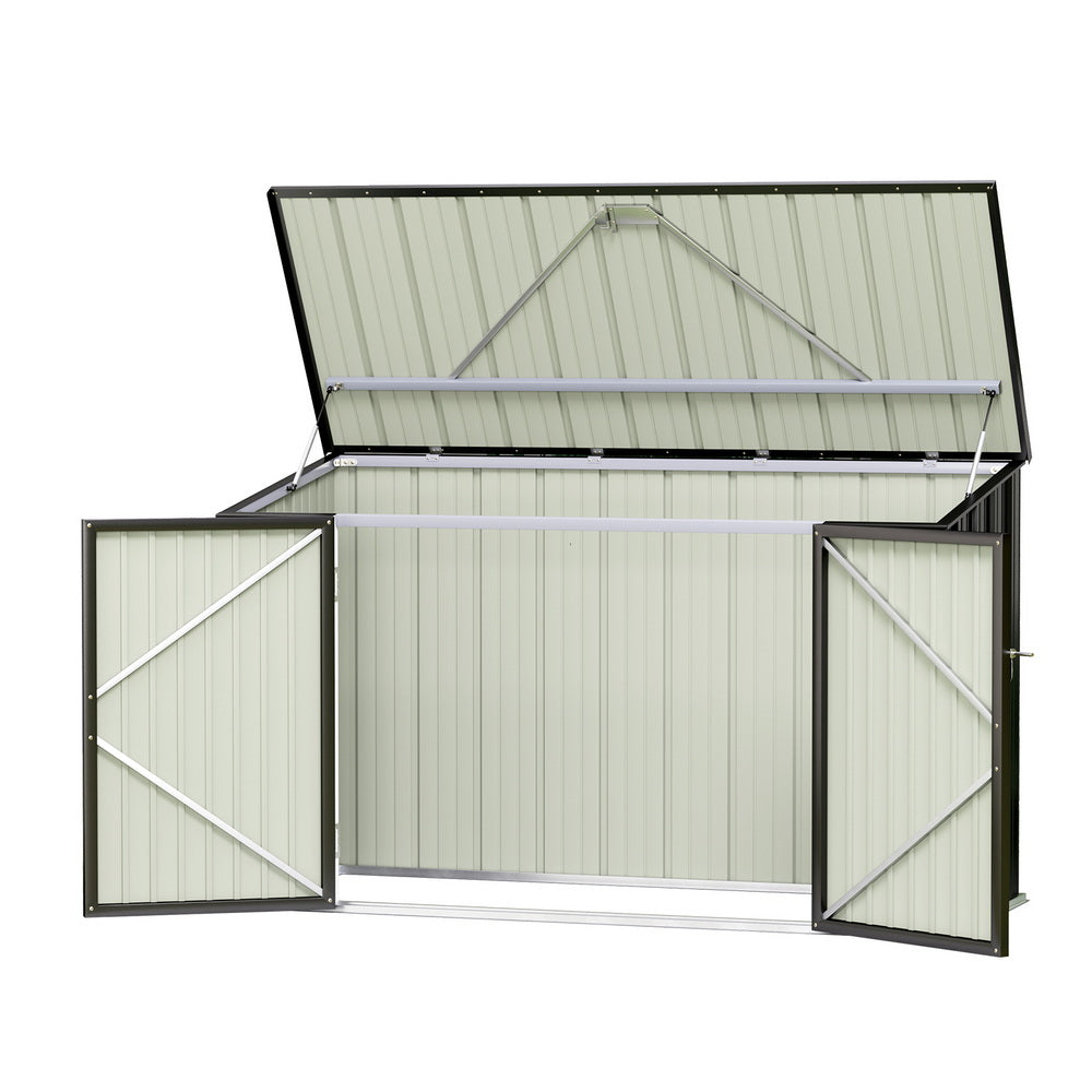 Narrow Giantz bike shed against a fence in a small backyard